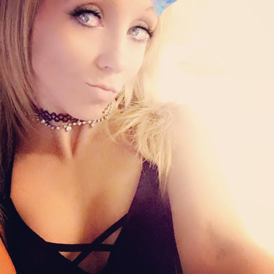 Offering tantric erotic sensual massage. Come enjoy a full service erotic sensual massage, Full body rub with Nikki Breezy.  NIkki in her bra at work.